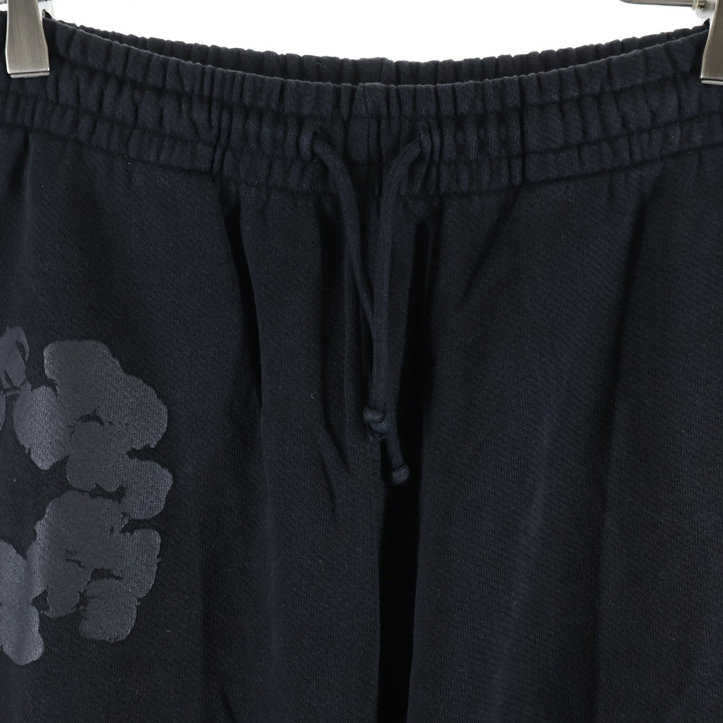 DENIM TEARS(デニムティアーズ) MONO COTTON WREATH SWEAT PANTS モノコットン フラワーモチーフ スウェットパンツ ブラック
