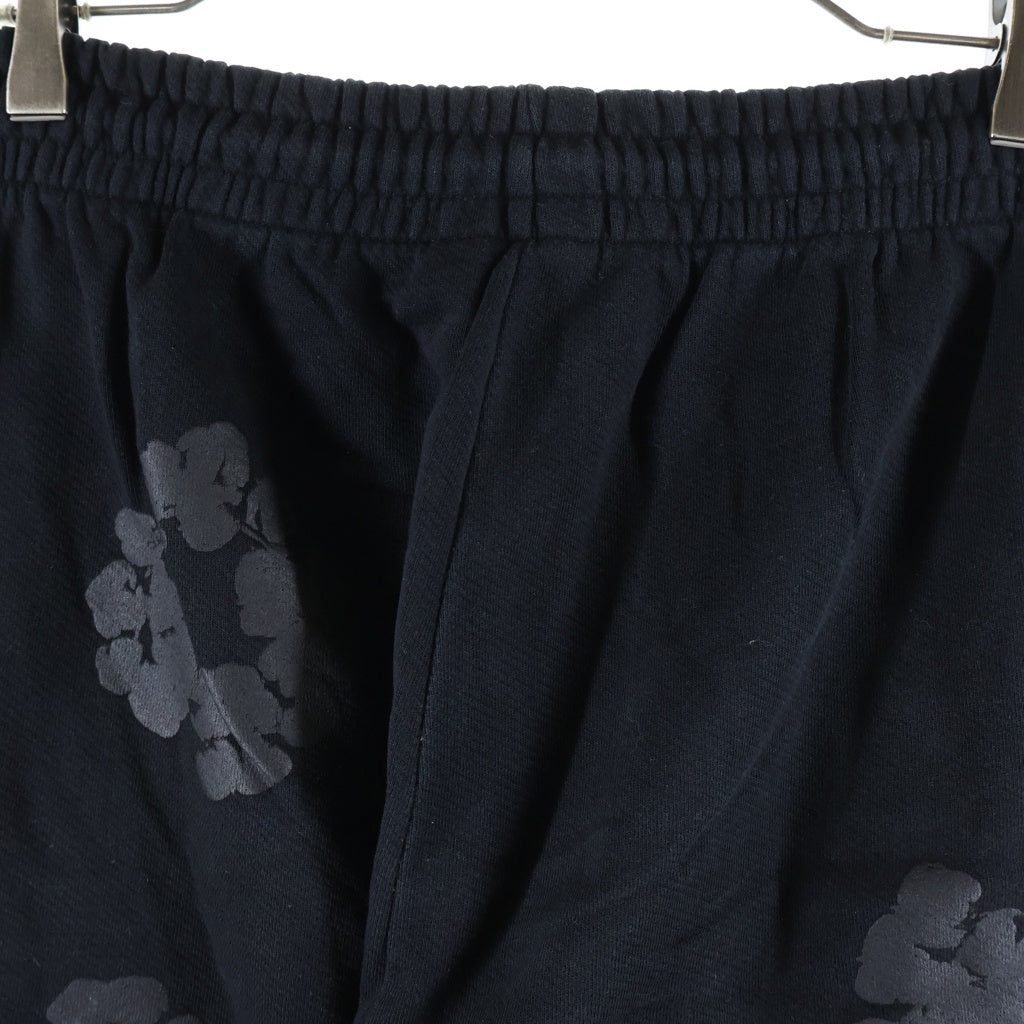 DENIM TEARS(デニムティアーズ) MONO COTTON WREATH SWEAT PANTS モノコットン フラワーモチーフ スウェットパンツ ブラック