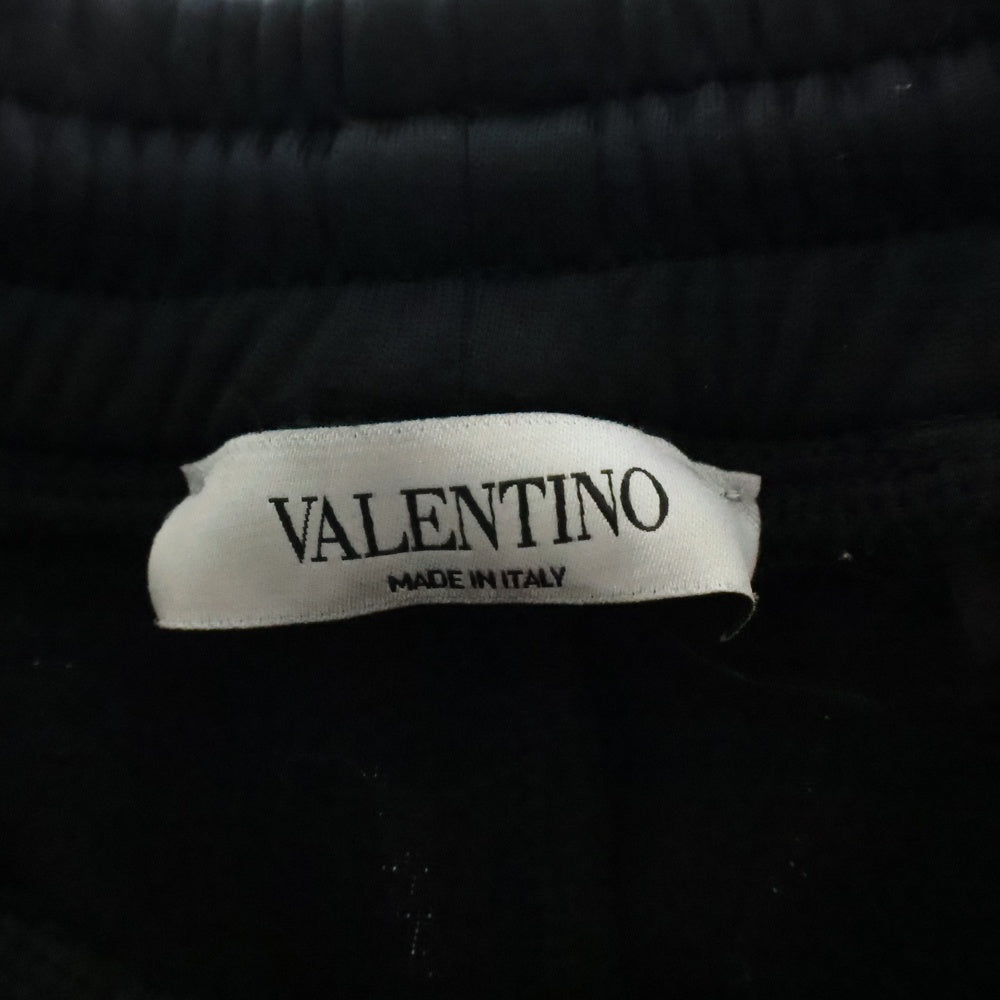 VALENTINO(ヴァレンチノ) ロゴプリント 裾ジップトラックパンツ ブラック RV3MD00Q584