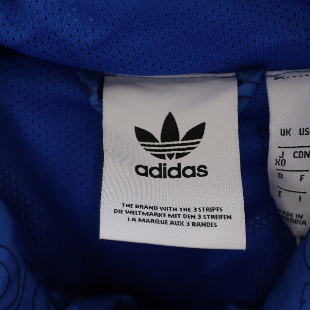 adidas Originals(アディダスオリジナルス) MONO WINDBREAKER モノ ウィンドブレーカー ロゴ総柄 ジャケット ブルー ED7046