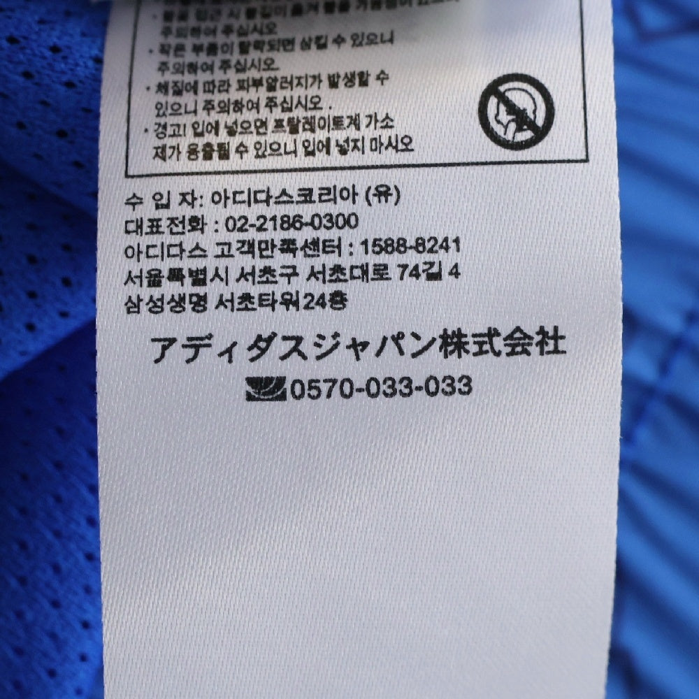 adidas Originals(アディダスオリジナルス) MONO WINDBREAKER モノ ウィンドブレーカー ロゴ総柄 ジャケット ブルー ED7046