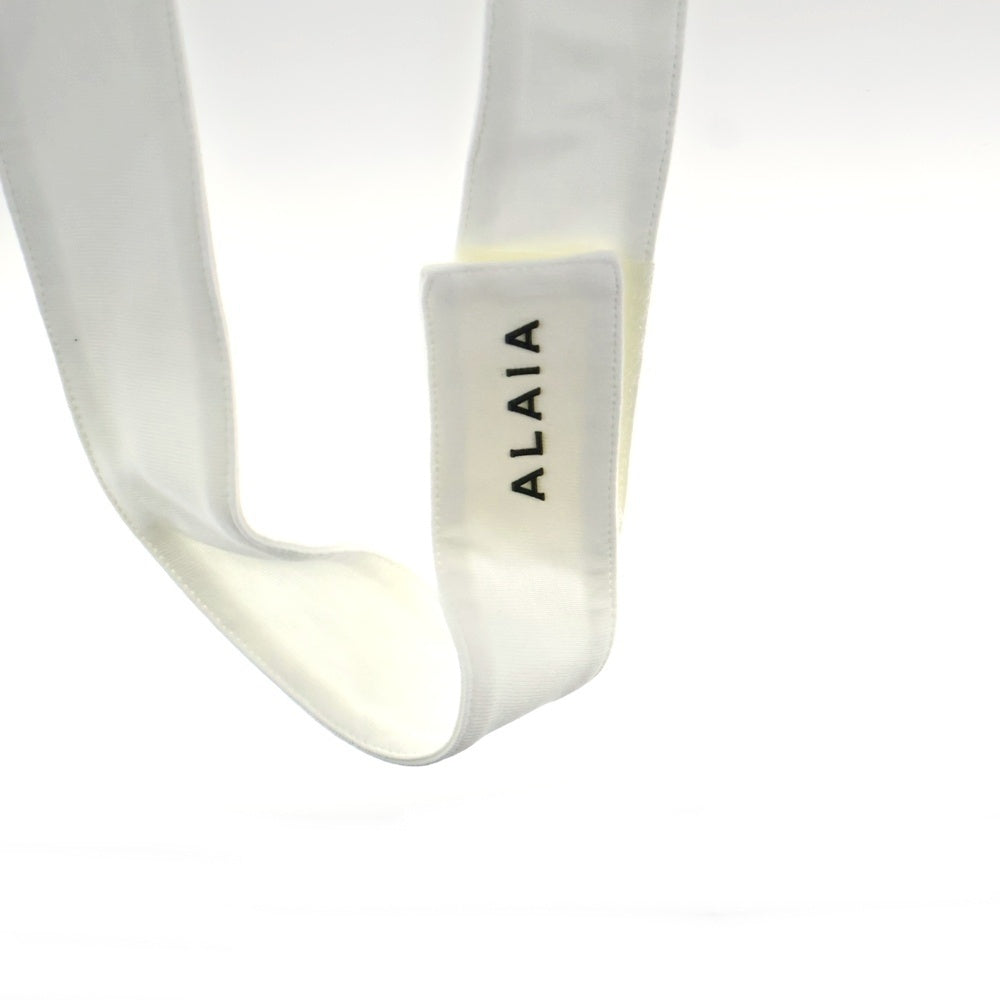ALAIA(アライア) ウエストストラップ ロゴクロップトップ レディース ホワイト AA9H04084J010