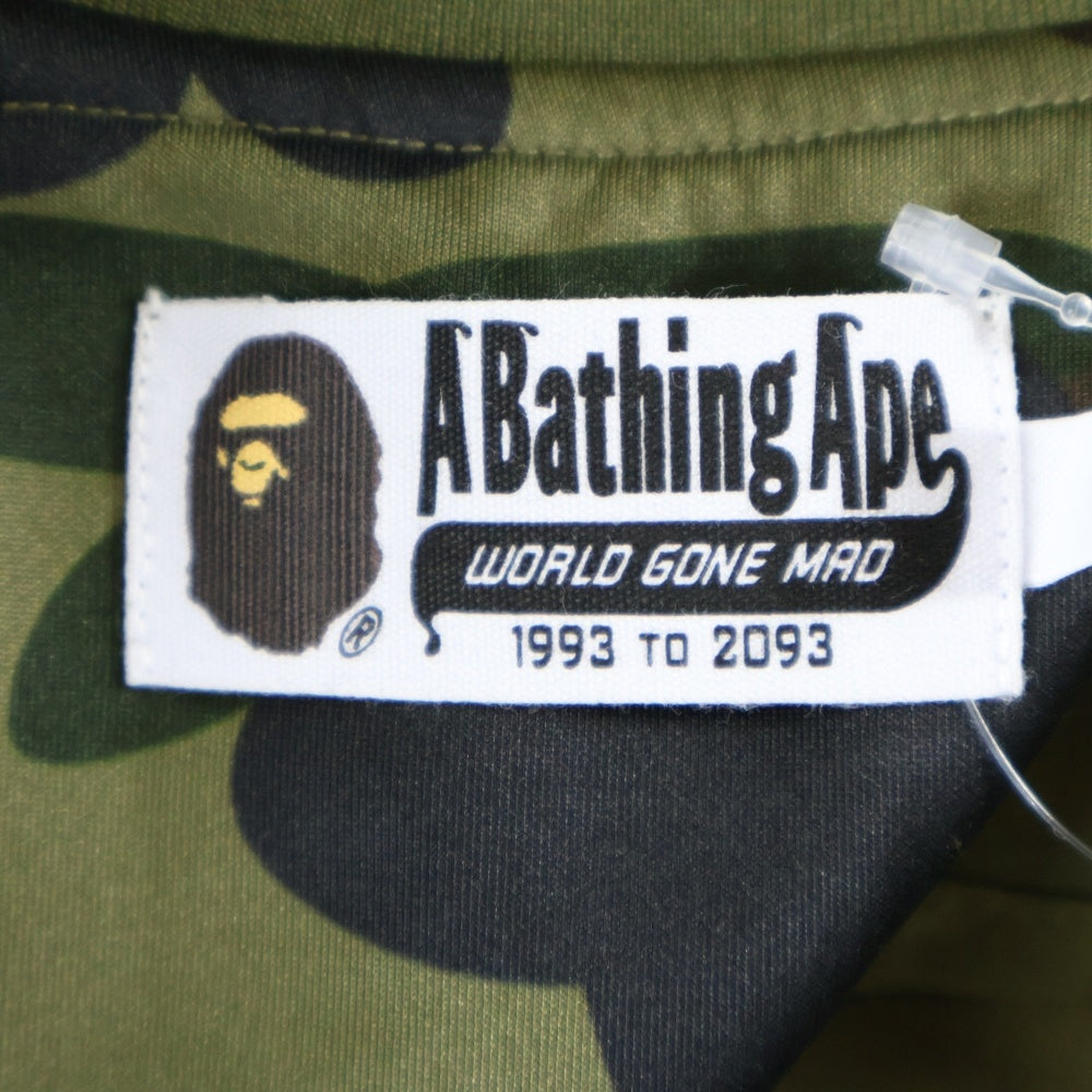 A BATHING APE(アベイシングエイプ) 1ST CAMO RELAXD FIT TRACK JACKET カモ総柄 エイプヘッドプリント ロゴサイドラインジップアップトラックジャケット グリーン 1L80-115-008