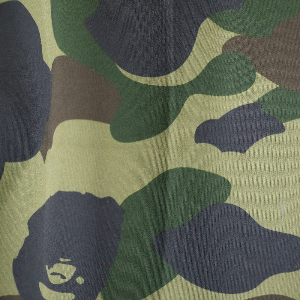 A BATHING APE(アベイシングエイプ) 1ST CAMO LOOSE FIT TRACK PANTS カモ総柄 エイプヘッドプリント ロゴサイドライン トラックパンツ グリーン 1L80-115-008