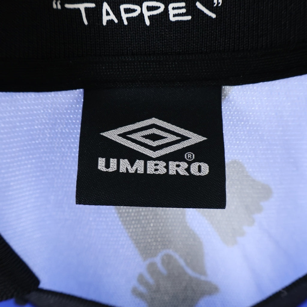 UMBRO(アンブロ) ×FUTURE ARCHIVE×TAPPEI フロントロゴ 総柄半袖ゲームシャツ ブルー UM24SSBE-GS01