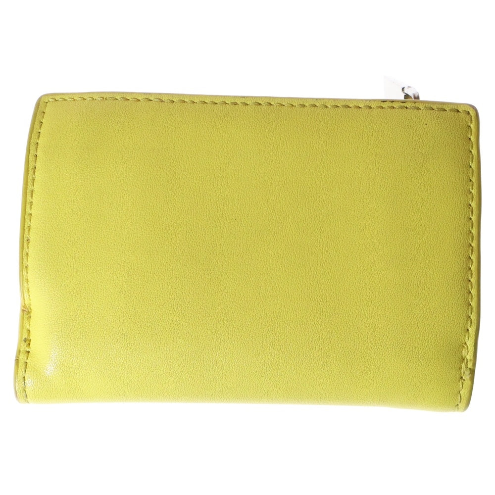 Calvin Klein(カルバンクライン) ロゴプレート レザー コンパクトウォレット 三つ折り財布 シルバー金具 イエロー