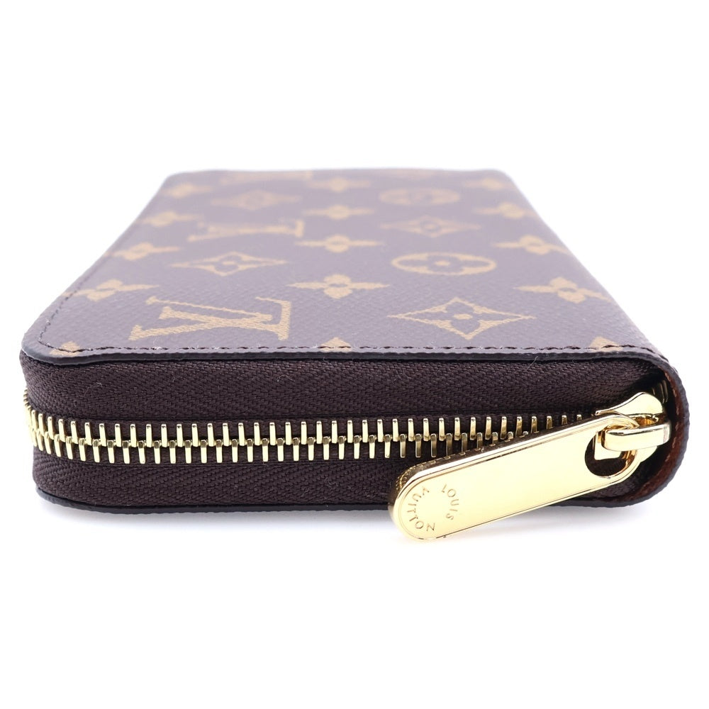 LOUIS VUITTON(ルイヴィトン) モノグラム ジッピー ウォレット フューシャ ラウンドファスナー ロングウォレット 長財布 ゴールド金具 ブラウン M41895