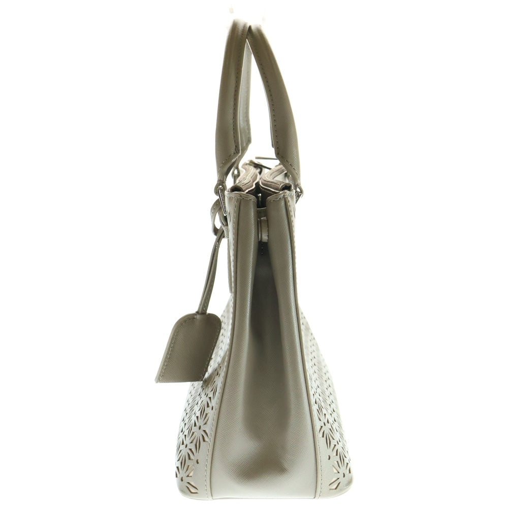 TORY BURCH(トリー バーチ) ロゴプレート パンチング PVC 2WAY ハンド ショルダーバッグ シルバー金具 ベージュ