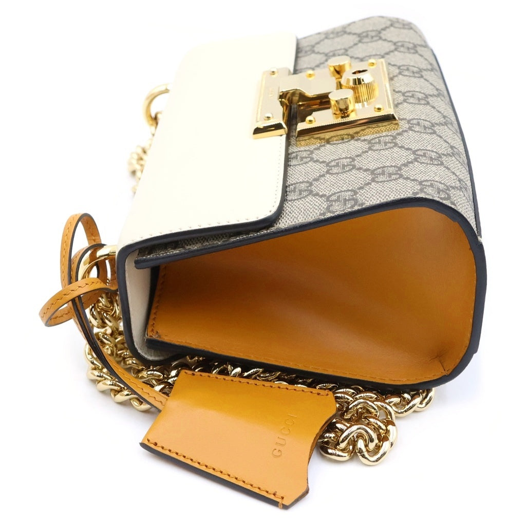GUCCI(グッチ) GG パドロック ショルダーバッグ ベージュ×アイボリー×オレンジ PVC×レザー 409487 レディース
