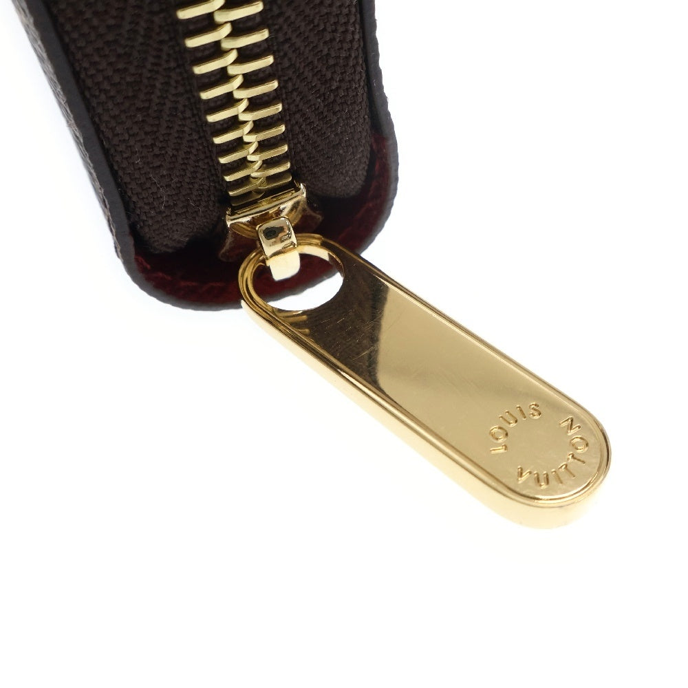 LOUIS VUITTON(ルイヴィトン) モノグラム ジッピーウォレット フューシャ ラウンドファスナー長財布 ブラウン PVCレザー RFID M41895