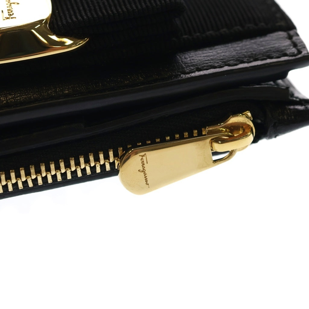 FERRAGAMO(フェラガモ) ヴァラリボン ロゴ レザー 二つ折り財布 ブラック レディース