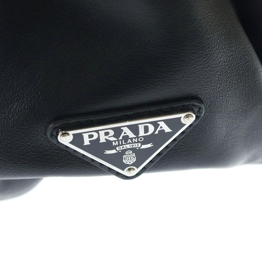 PRADA(プラダ) 三角ロゴ レザー バックパック リュック 三角ロゴ プレート トライアングル ブラック