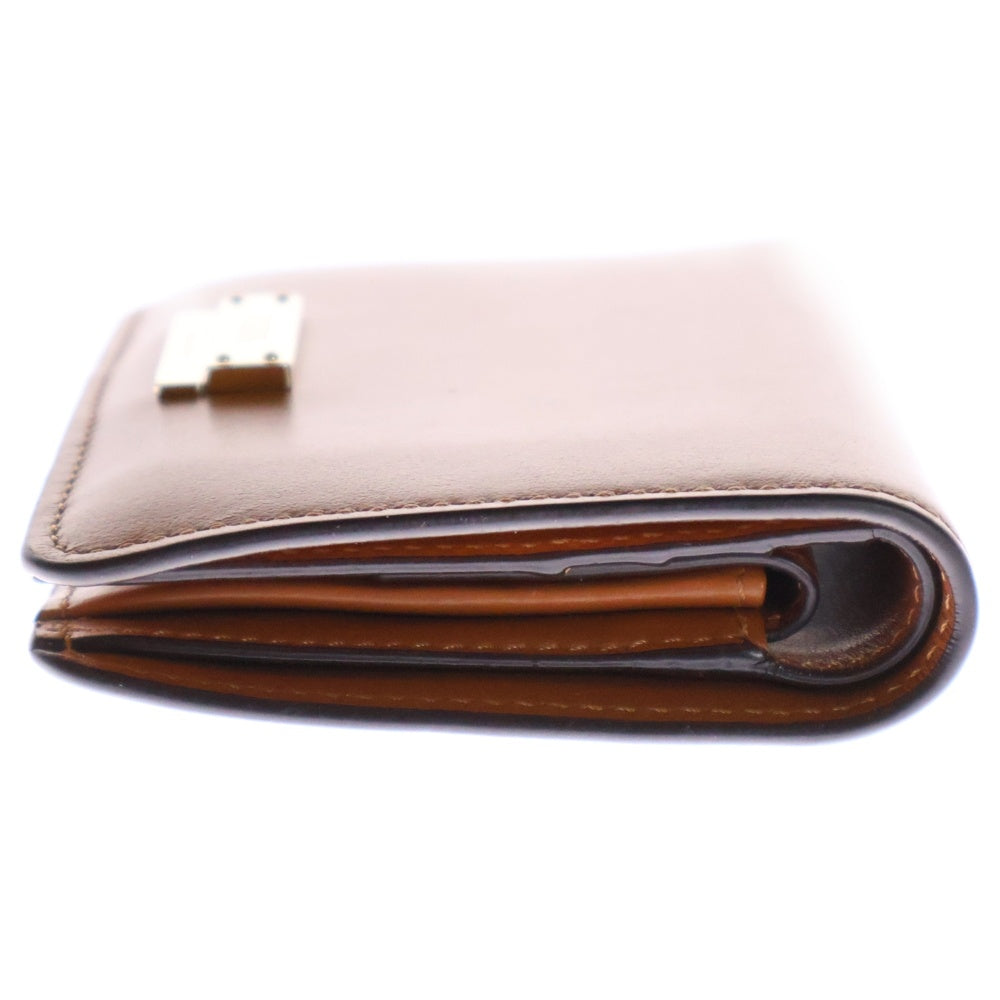 TOD'S(トッズ) 2つ折り財布 コンパクトウォレット ゴールド キャメル ゴールド金具 レザー