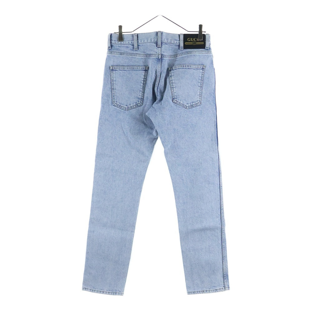 GUCCI(グッチ) ヴィンテージロゴプリント レザーパッチ ウォッシュ加工 ボタンフライ テーパード デニムパンツ ジーンズ インディゴ レディース 408637