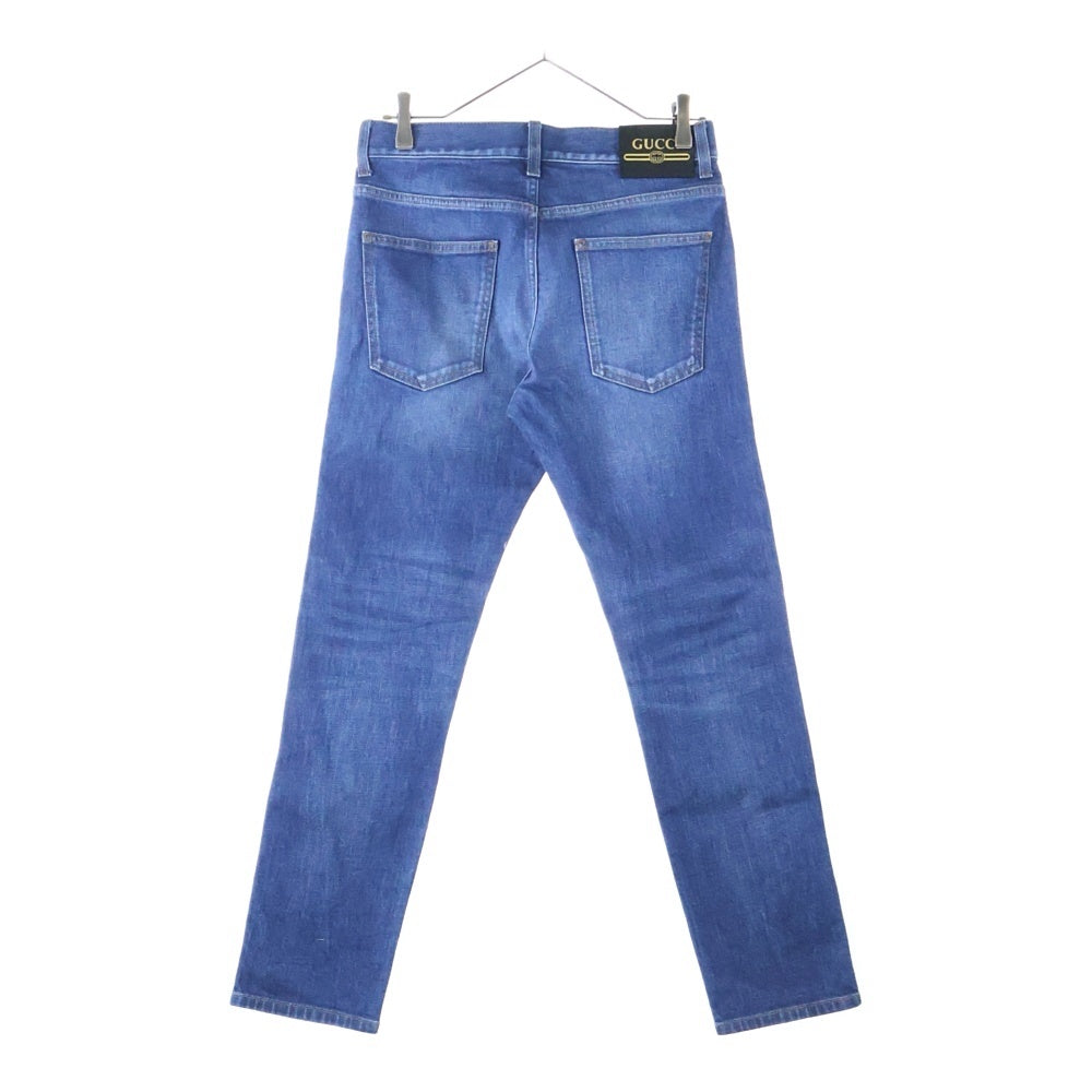 GUCCI(グッチ) ヴィンテージロゴ レザーパッチ ボタンフライ ウォッシュ加工 テーパード デニムパンツ ジーンズ インディゴ 408637