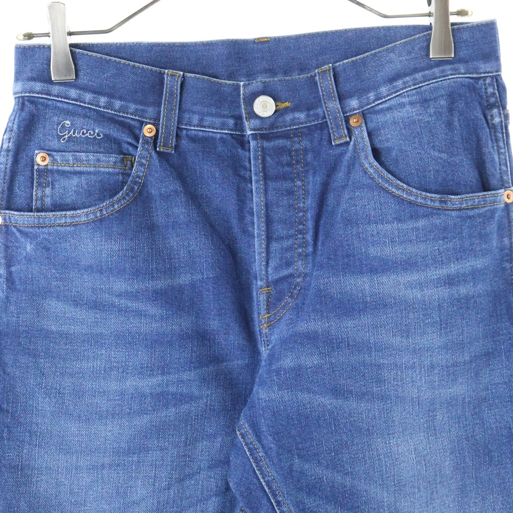 GUCCI(グッチ) ヴィンテージロゴ レザーパッチ ボタンフライ ウォッシュ加工 テーパード デニムパンツ ジーンズ インディゴ 408637