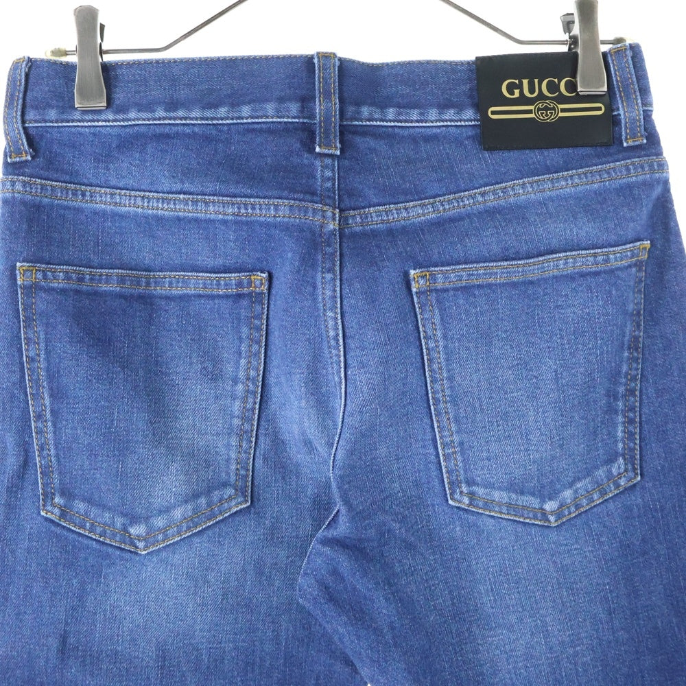 GUCCI(グッチ) ヴィンテージロゴ レザーパッチ ボタンフライ ウォッシュ加工 テーパード デニムパンツ ジーンズ インディゴ 408637