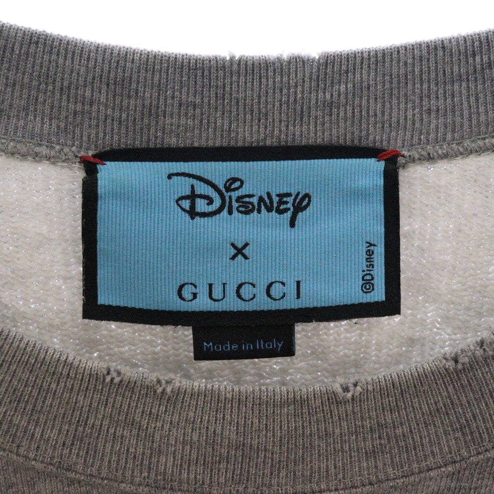 GUCCI(グッチ) ×Disney Donald Duck Sweatshirt ディズニー キャラクタープリント ダメージ加工クルーネックスウェットトレーナー グレー 623245 XJDAJ
