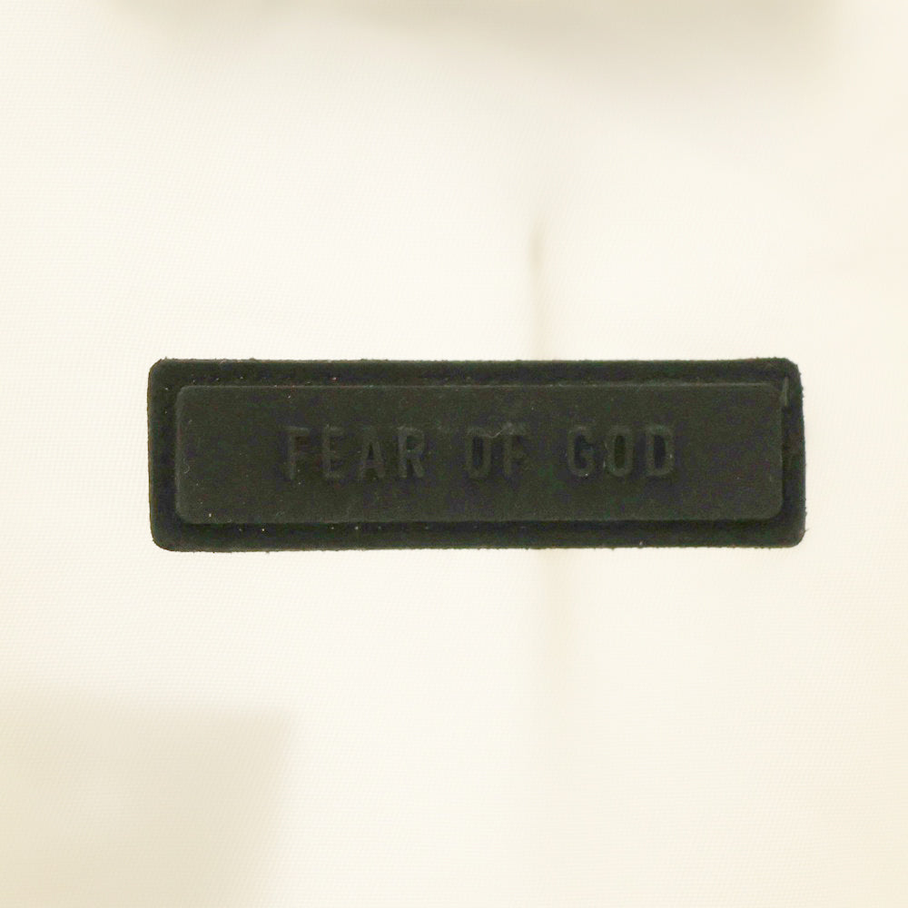 FEAR OF GOD ESSENTIALS(フィアオブゴッド エッセンシャルズ) NYLON COACH JACKET バックラバーロゴ ナイロンコーチジャケット アイボリー