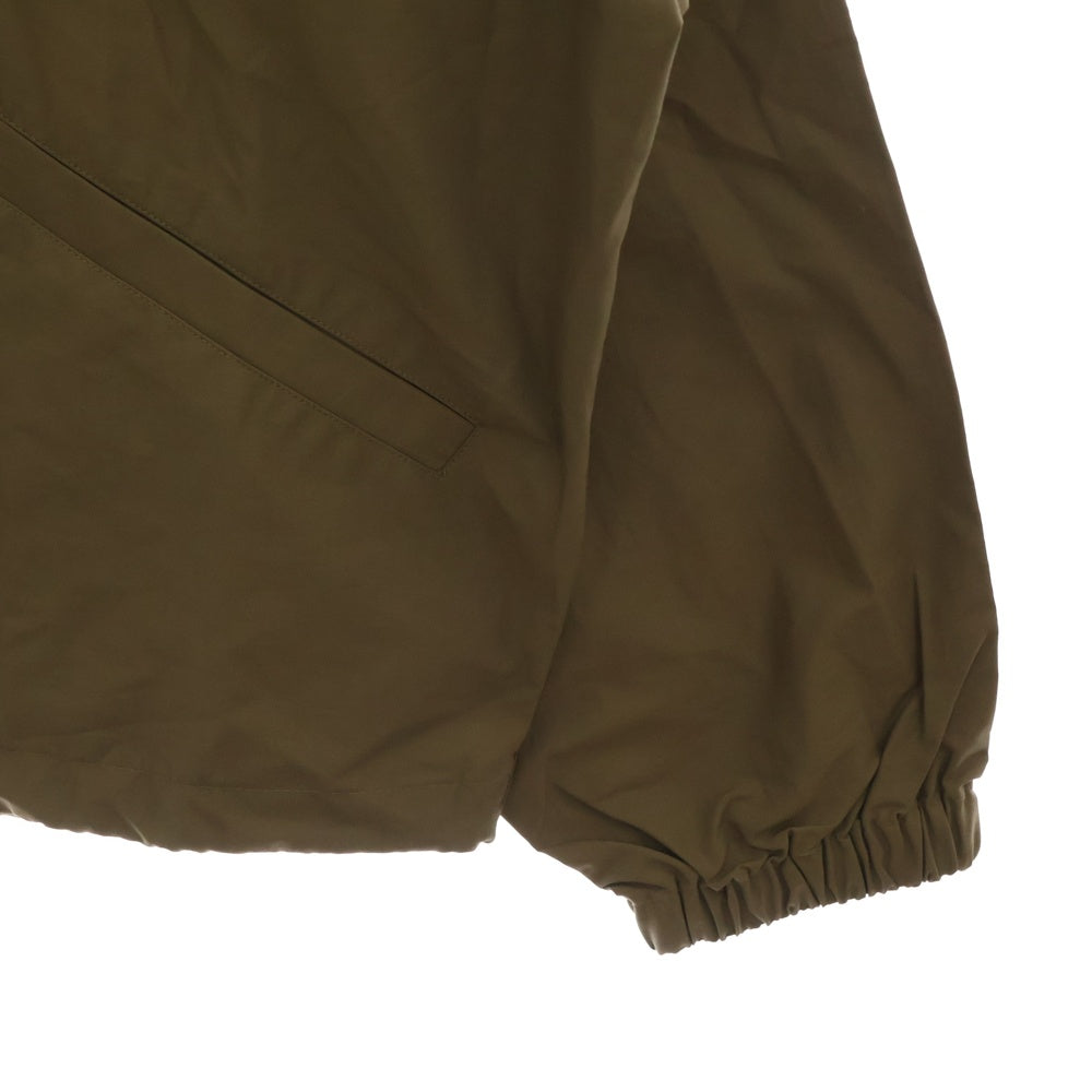 FEAR OF GOD ESSENTIALS(フィアオブゴッド エッセンシャルズ) HALF ZIP NYLON JACKET リフレクターロゴ ハーフジップナイロンジャケット ベージュ
