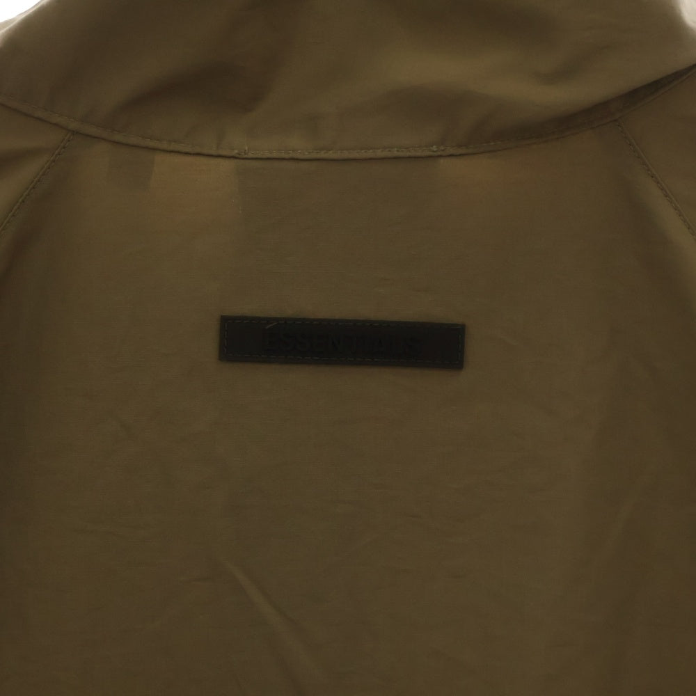 FEAR OF GOD ESSENTIALS(フィアオブゴッド エッセンシャルズ) HALF ZIP NYLON JACKET リフレクターロゴ ハーフジップナイロンジャケット ベージュ