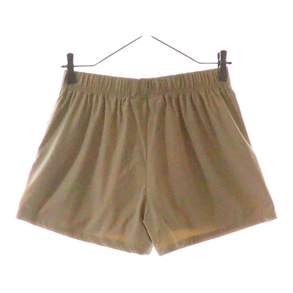 FEAR OF GOD ESSENTIALS(フィアオブゴッド エッセンシャルズ) NYLON SHORT PANTS ラバーロゴ ナイロンハーフパンツ ショーツ ベージュ