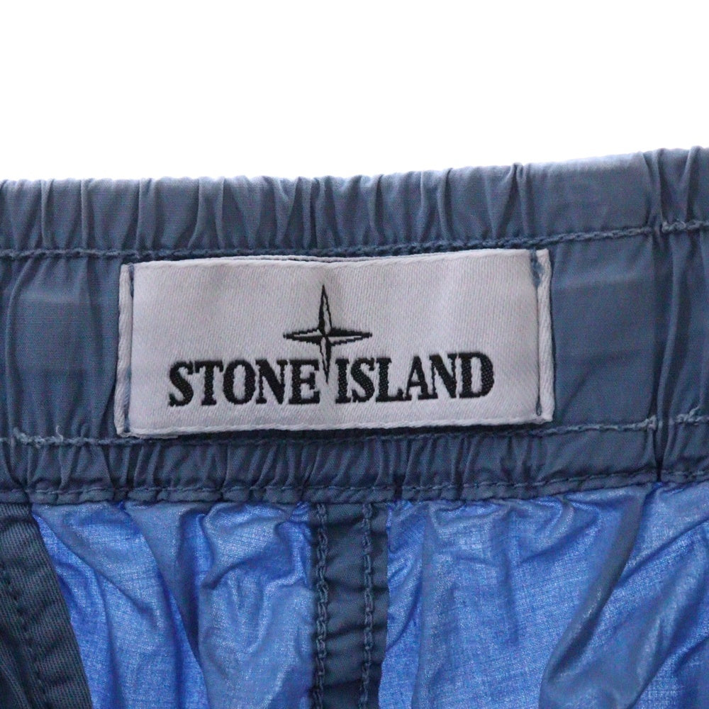 STONE ISLAND(ストーンアイランド) RE-T Garmentdyed Stretch Pants ロゴワッペンカーゴパンツ ブルー 761531303