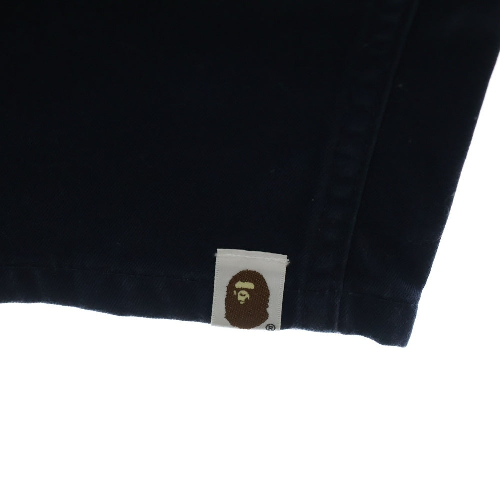 BAPE BY A BATHING APE(ベイプ ア ベイシング エイプ) BABY MILO CHINO PANTS ベイビーマイロチノパンツ ロゴプリントコットンチノストレートパンツ ネイビー