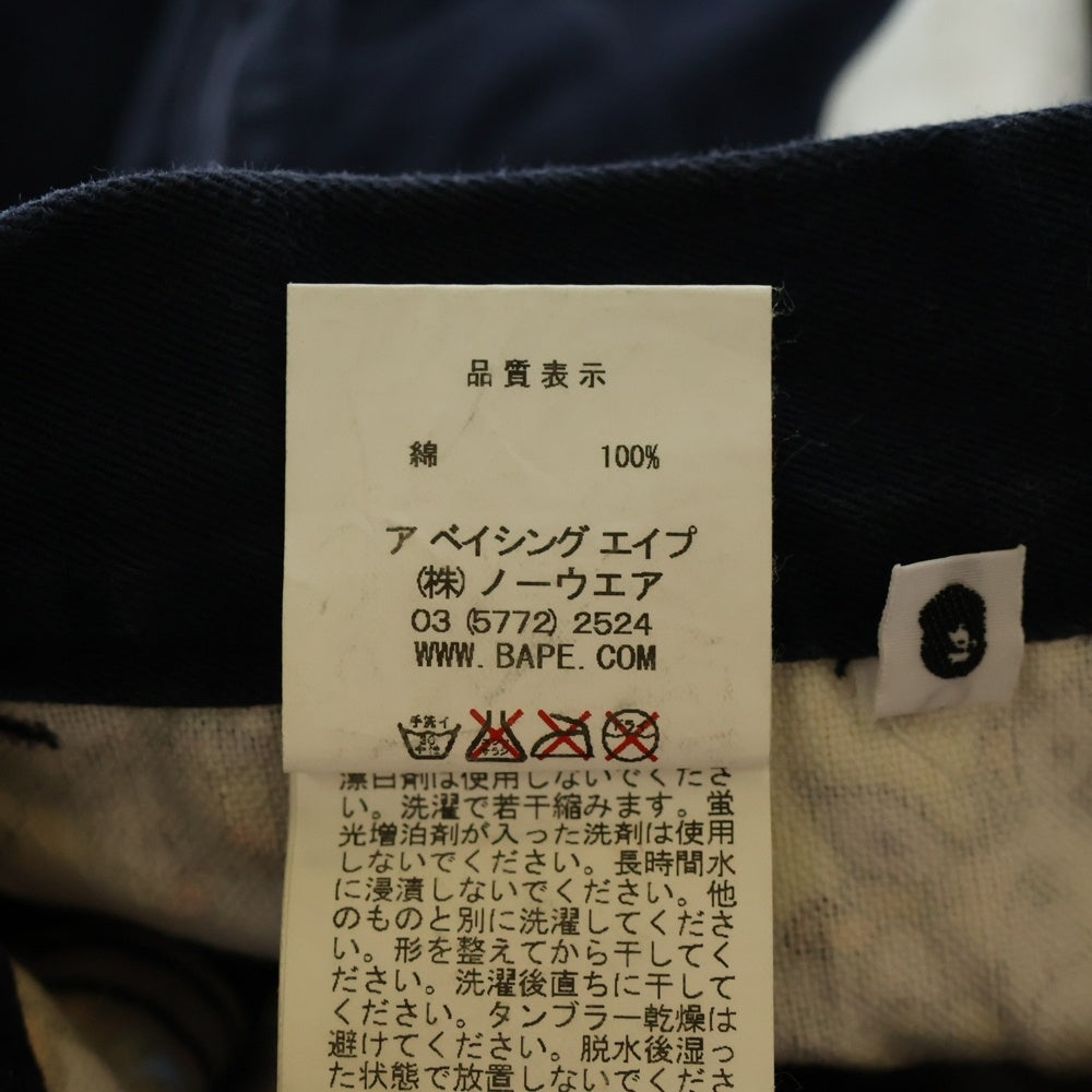 BAPE BY A BATHING APE(ベイプ ア ベイシング エイプ) BABY MILO CHINO PANTS ベイビーマイロチノパンツ ロゴプリントコットンチノストレートパンツ ネイビー