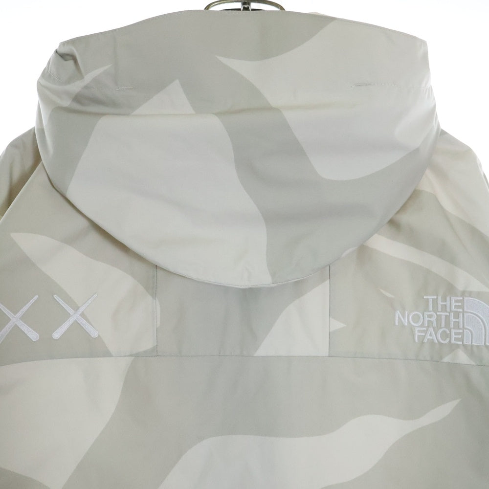 THE NORTH FACE(ザノースフェイス) 22SS ×KAWS RETRO 1986 MOUNTAIN PARKA JACKET カウズ マウンテンパーカー ナイロンジャケット ベージュ NF0A7WLW