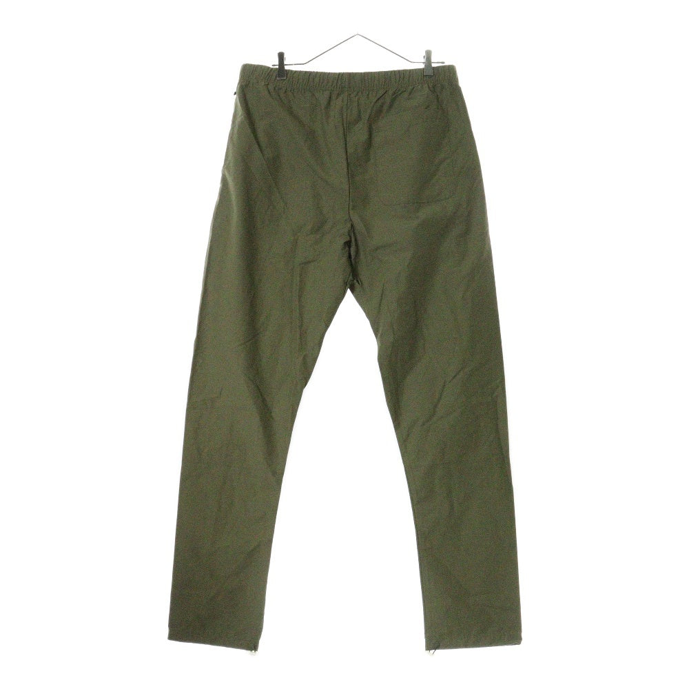 FEAR OF GOD ESSENTIALS(フィアオブゴッド エッセンシャルズ) NYLON PANTS リフレクターロゴ ナイロンパンツ カーキ