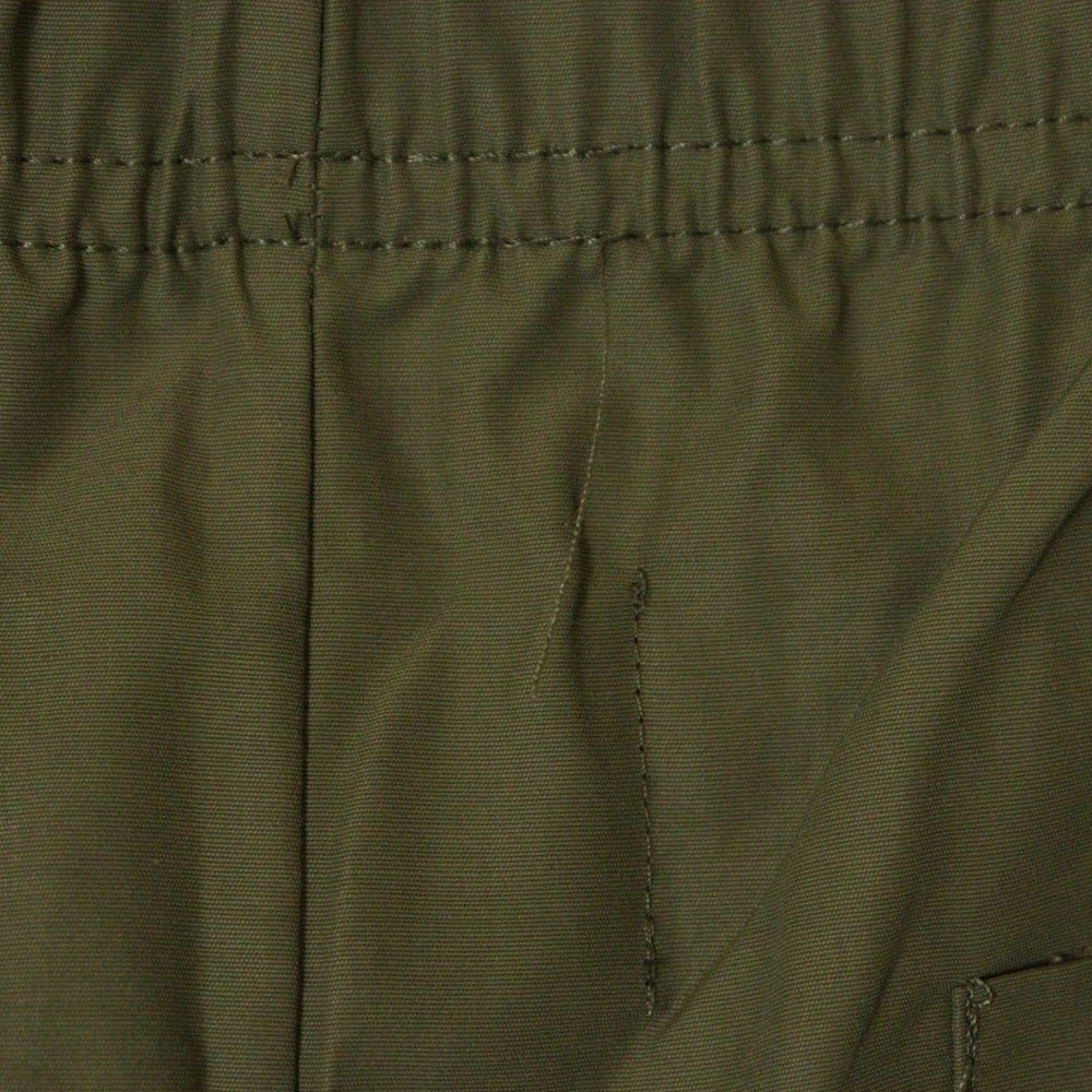 FEAR OF GOD ESSENTIALS(フィアオブゴッド エッセンシャルズ) NYLON PANTS リフレクターロゴ ナイロンパンツ カーキ