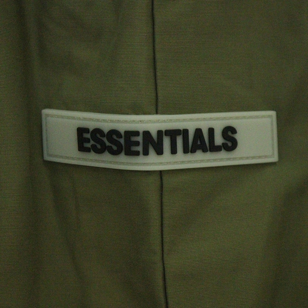 FEAR OF GOD ESSENTIALS(フィアオブゴッド エッセンシャルズ) NYLON PANTS リフレクターロゴ ナイロンパンツ カーキ