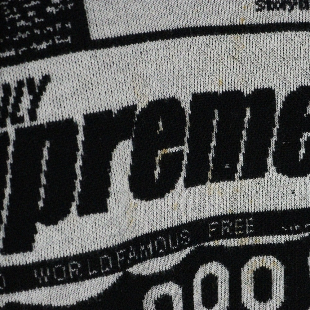 SUPREME(シュプリーム) 18AW News Print Sweater ニュースプリントセーター 総柄クルーネック長袖ニットセーター ブラック