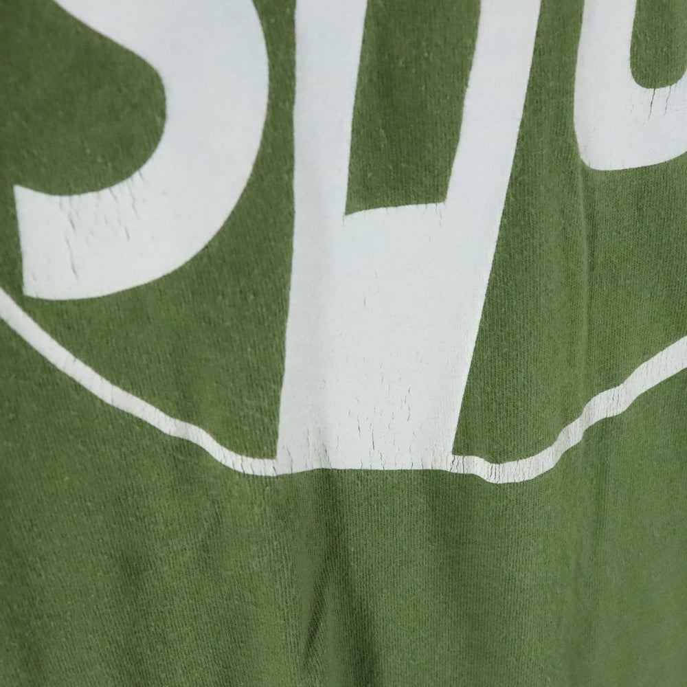 STUSSY(ステューシー) VINTAGE PIL MOTIF FRONT LOGO TEE ヴィンテージ モチーフフロントロゴ カーキ