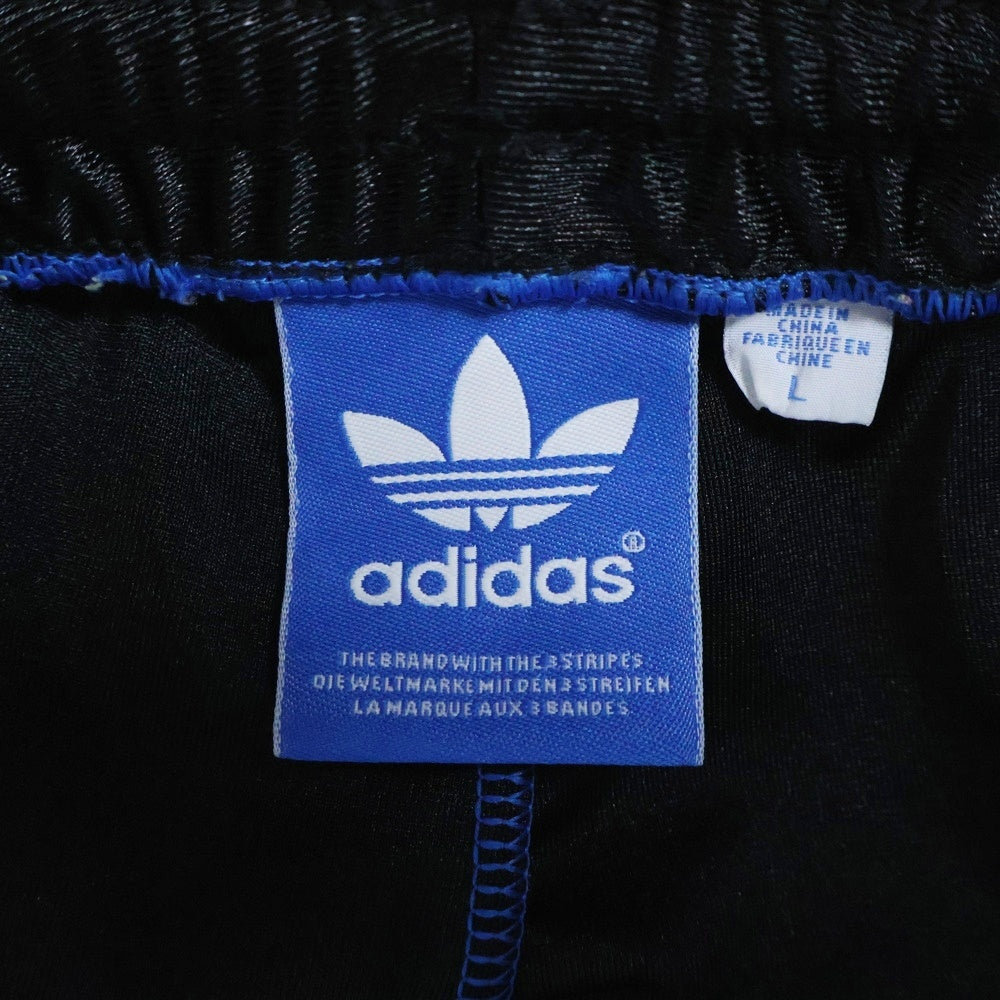 adidas(アディダス) ロゴパッチ ナイロントラックパンツ ブルー