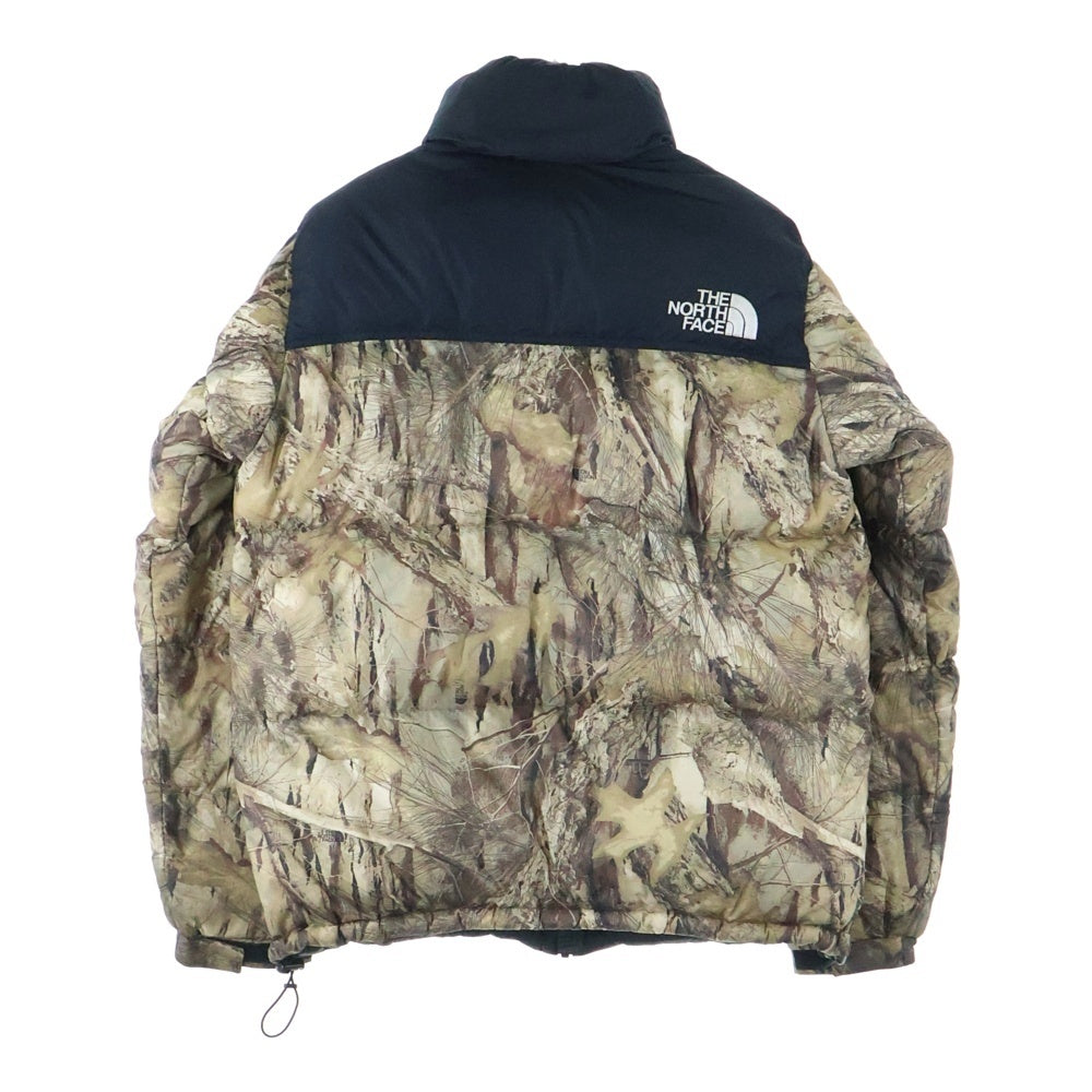 THE NORTH FACE(ザノースフェイス) NOVELTY NUPTSE JACKET Leaves リアルツリーカモ柄ノベルティヌプシダウンジャケット ブラウン ND42230R
