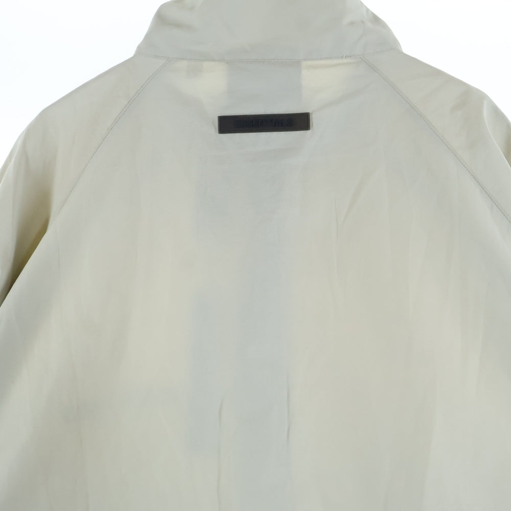 FEAR OF GOD ESSENTIALS(フィアオブゴッド エッセンシャルズ) HALF ZIP NYLON JACKET リフレクターロゴ ハーフジップ ナイロンジャケット ベージュ