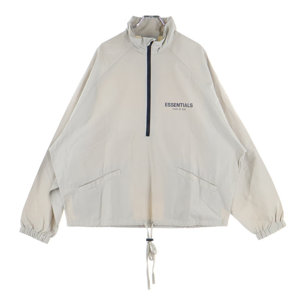 FEAR OF GOD ESSENTIALS(フィアオブゴッド エッセンシャルズ) HALF ZIP NYLON JACKET リフレクターロゴ ハーフジップ ナイロンジャケット ベージュ