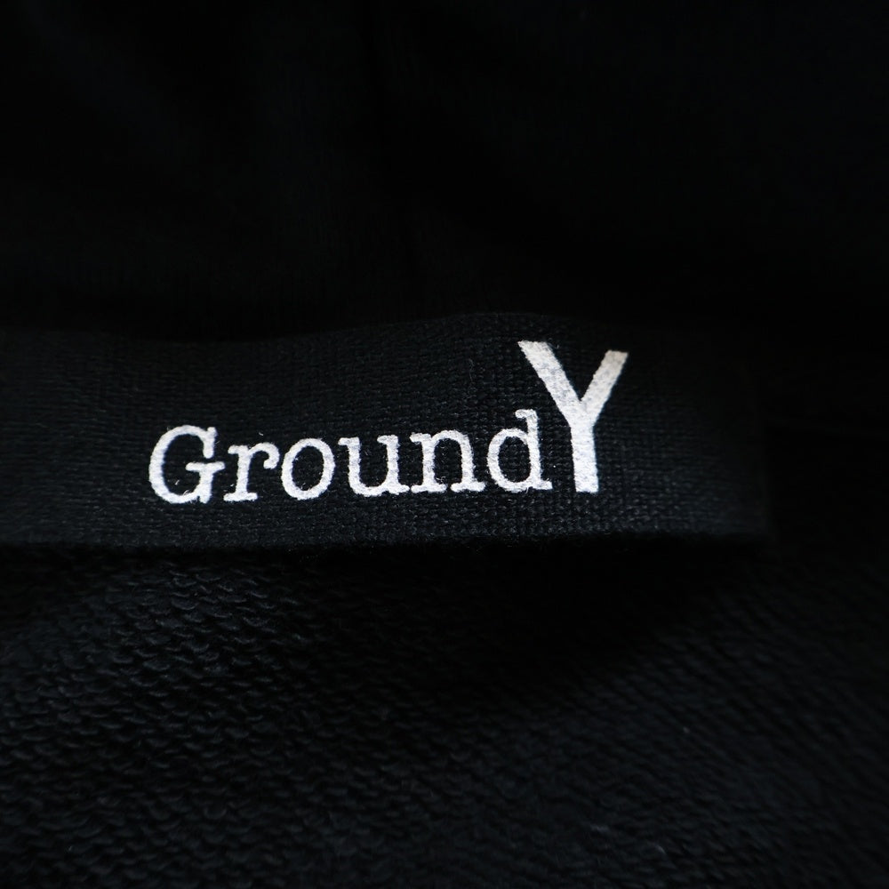 Ground Y(グラウンドワイ) ×CHAINSAW MAN Gun Devil Cotton Fleece Hoodie チェンソーマン ダメージ加工 フロントロゴパッチ付き ジップアップパーカー フーディ ブラック GF-T70-070