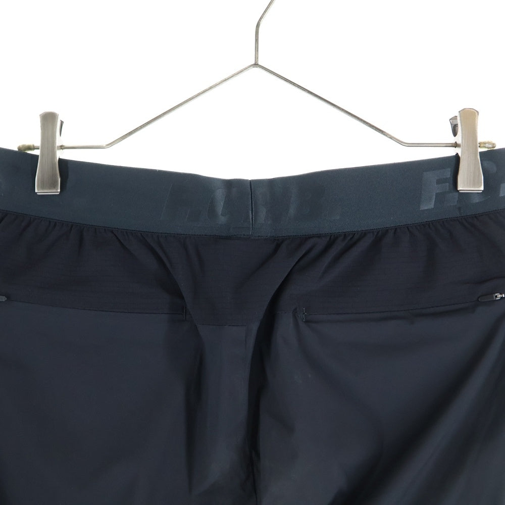 F.C.R.B./F.C.Real Bristol/FCRB(エフシーアールビー/エフシーレアルブリストル) 22SS STRETCH EASY TAPERED PANTS ロゴ イージーナイロンパンツ ネイビー FCRB-222030