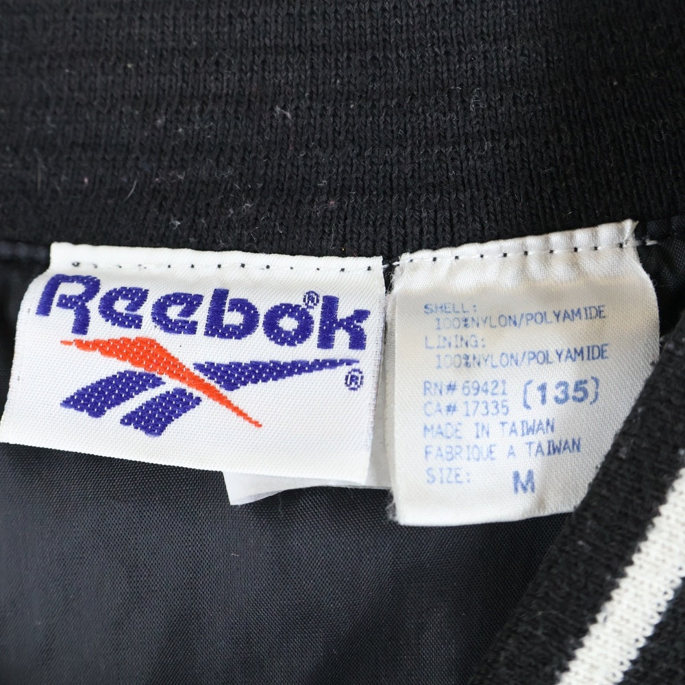 Reebok(リーボック) V Neck Nylon Jacket ロゴ刺繍 Vネックプルオーバーナイロンジャケット ブラック