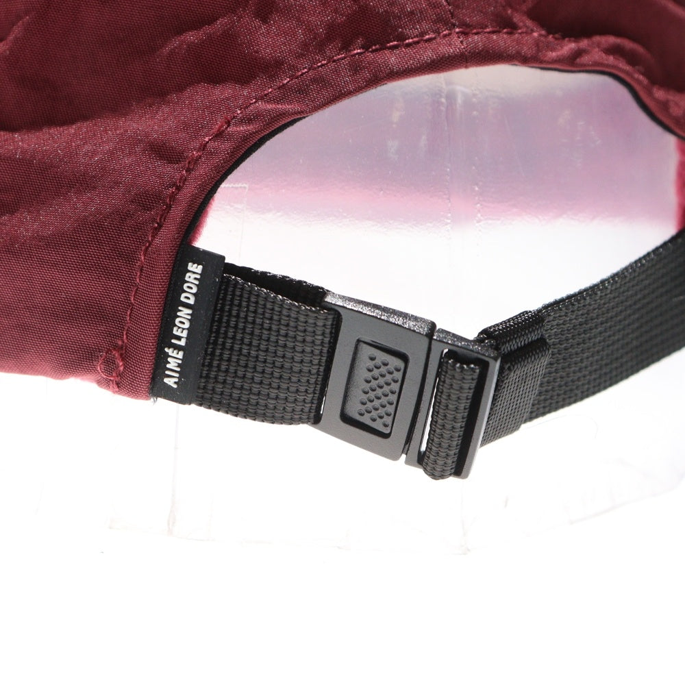 Aime Leon Dore(エメレオンドレ) 23AW Unisphere Shell Cap ロゴ刺繍ナイロンキャップ 帽子 バーガンディ