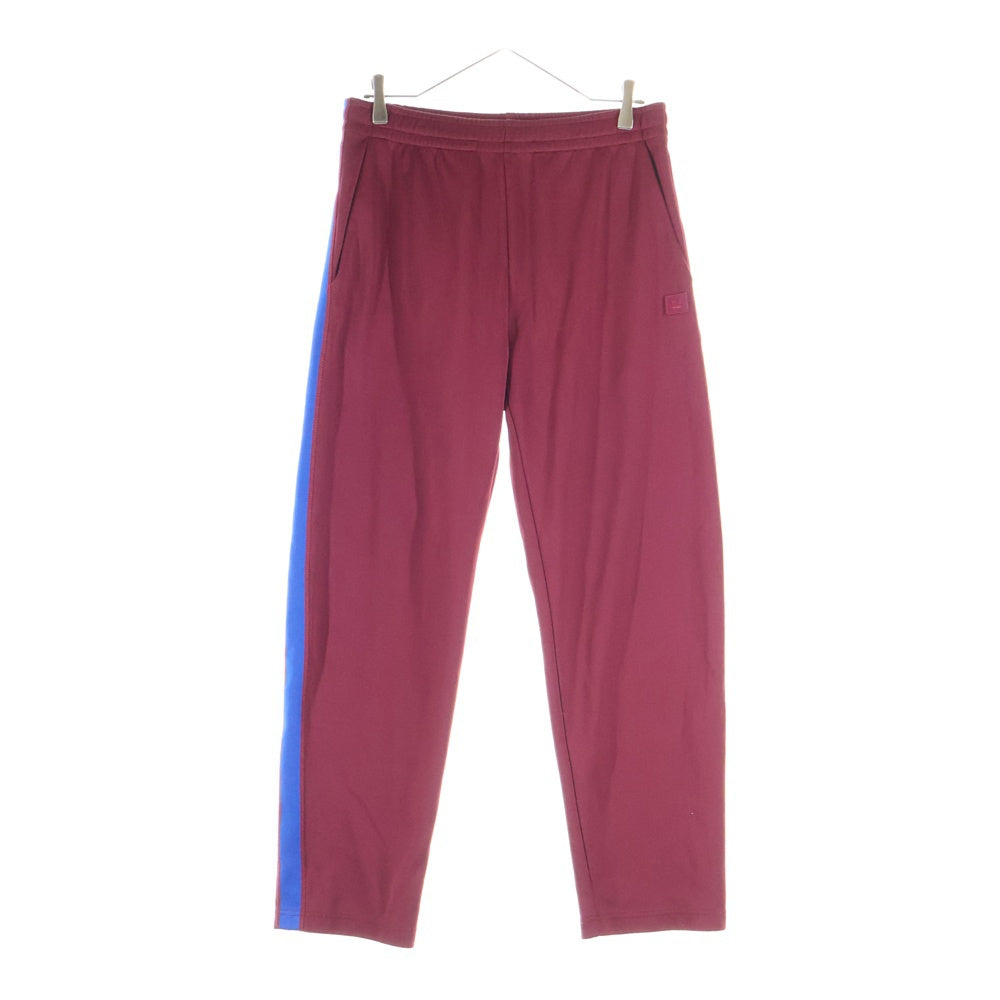 Acne Studios(アクネ ストゥディオズ) サイドライン ドローコード トラックパンツ レッド