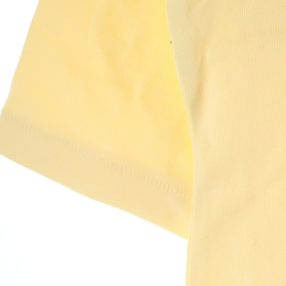 FEAR OF GOD ESSENTIALS(フィアオブゴッド エッセンシャルズ) FOOTBALL TEE Vネック ラバーロゴ フットボール半袖Tシャツ イエロー