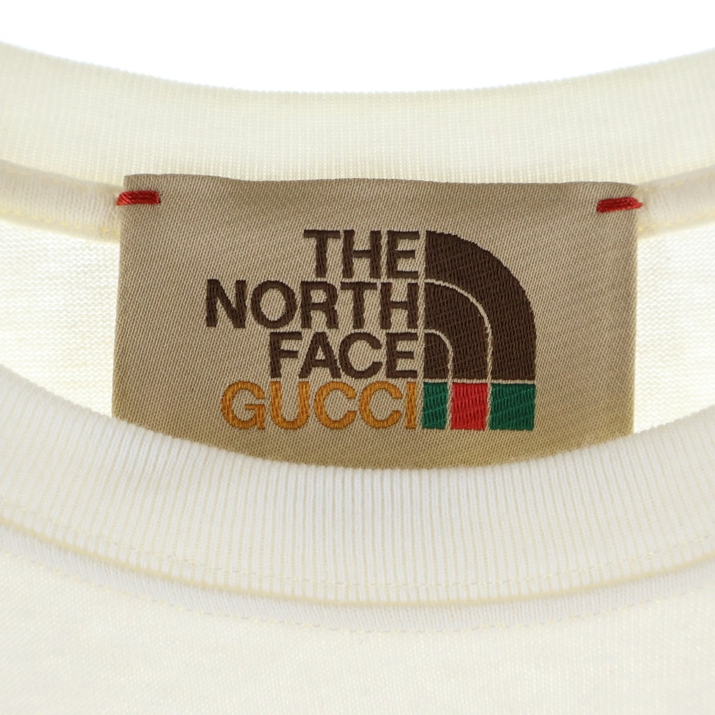 GUCCI(グッチ) ×THE NORTH FACE Oversize T-Shirt ノースフェイス ダブルネームロゴ クルーネック カットソー 半袖Tシャツ アイボリー 615044 XJDBZ
