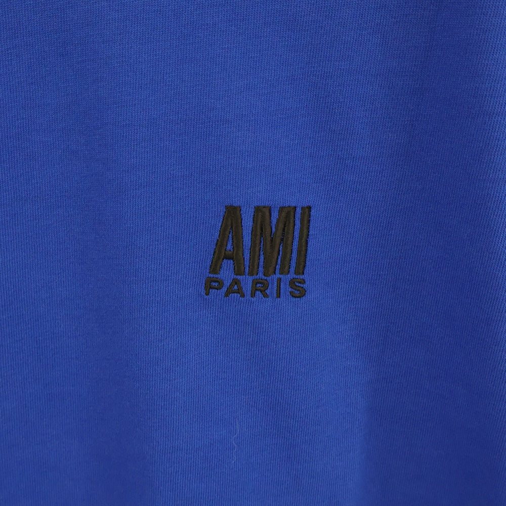 AMI Alexandre Mattiussi(アミアレクサンドルマテュッシ) ロゴ刺繍オーバーサイズ半袖Tシャツ ブルー H21HJ101.726