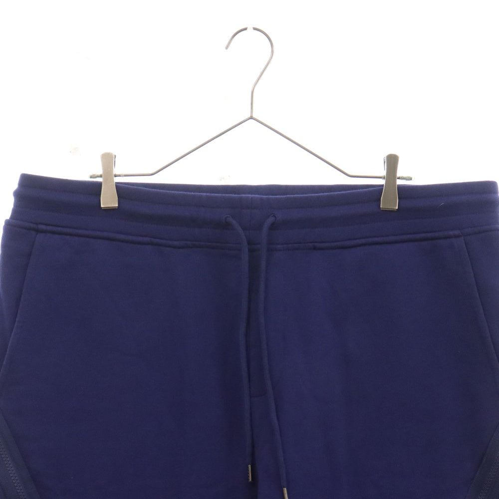 C.P. Company(シーピーカンパニー) DIAGONAL RAISED FLEECE UTILITY SWEATPANTS ZIP ロゴジップ スウェットパンツ ブルー 11CMSP061A