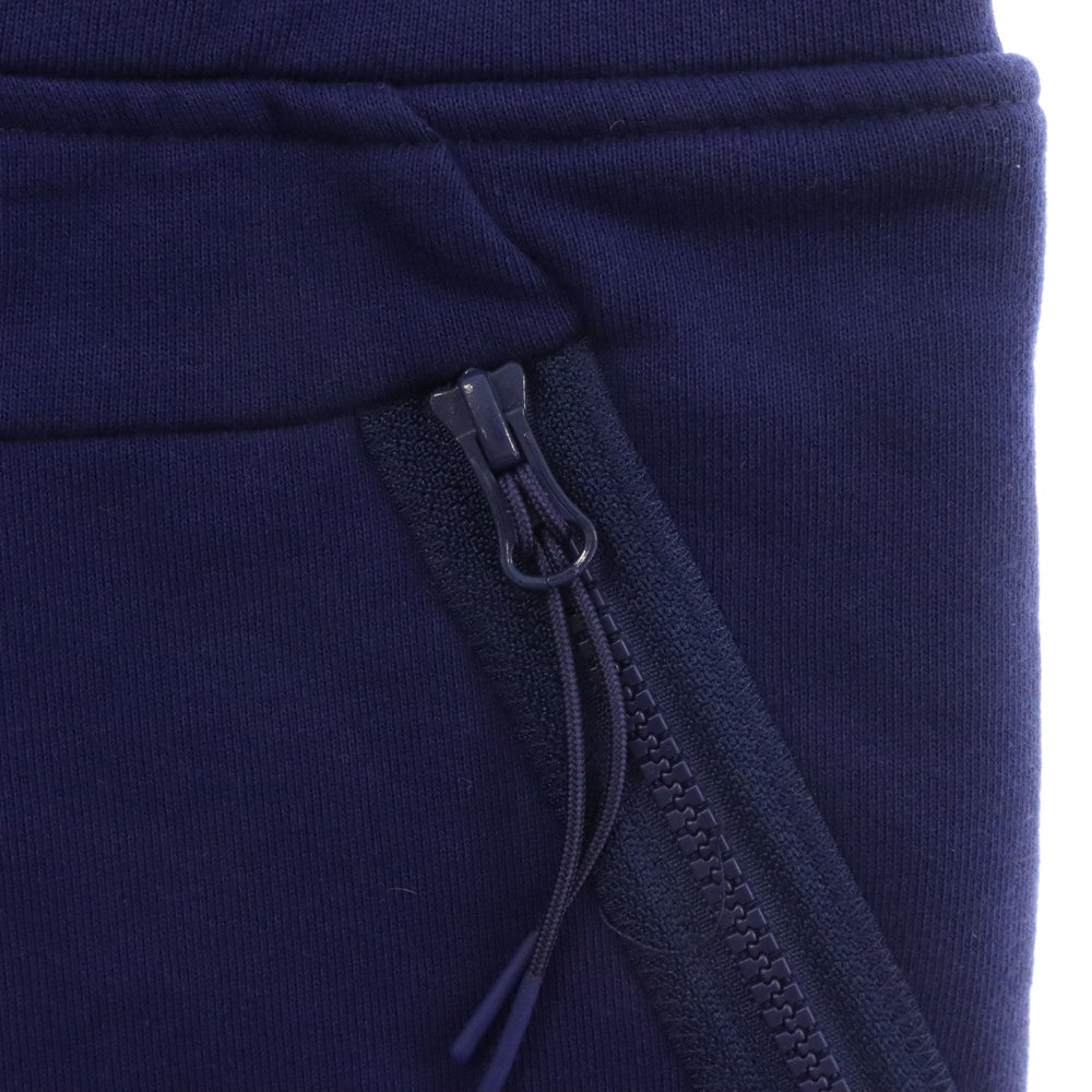 C.P. Company(シーピーカンパニー) DIAGONAL RAISED FLEECE UTILITY SWEATPANTS ZIP ロゴジップ スウェットパンツ ブルー 11CMSP061A