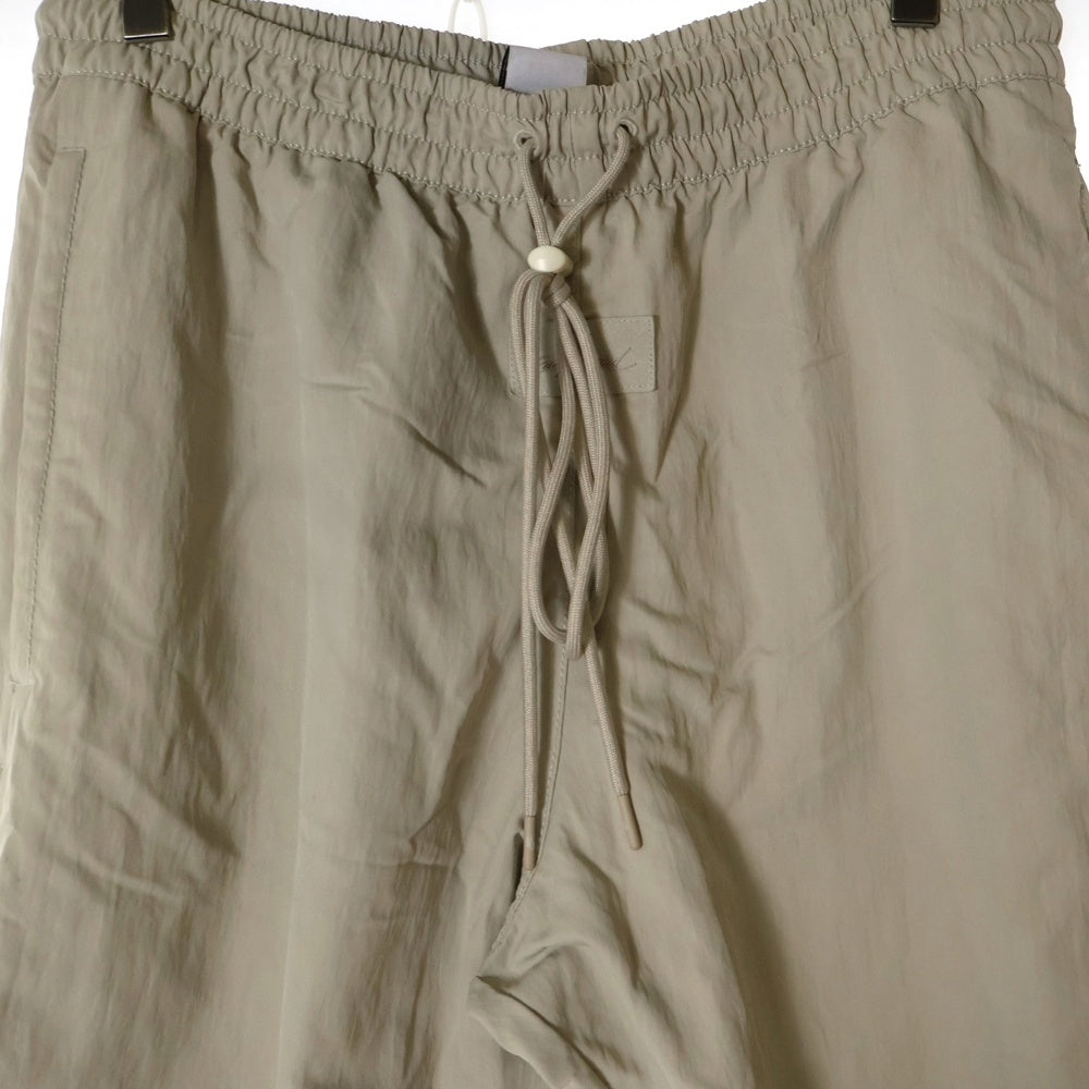 NIKE(ナイキ) × FEAR OF GOD WARM UP PANTS CU4684-271 ウォームアップ イージーパンツ ベージュ